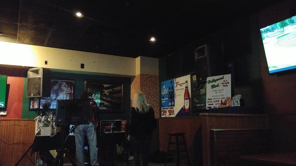 Live music space with open floor and seating.