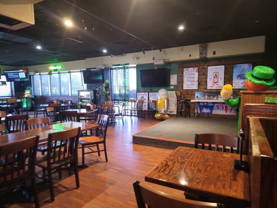 Sports bar atmosphere with games and drinks.